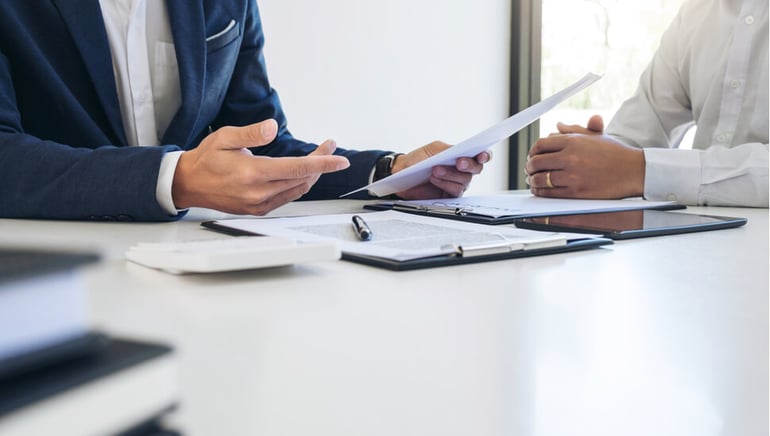 Businessmen in meeting room